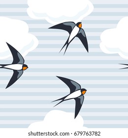 Seamless blue background of flying swallows in the sky