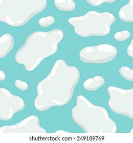 Seamless blue background with a pattern of white milk spots like clouds