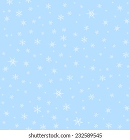 Seamless blue background with white snowflakes pattern