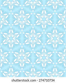 Seamless blue background with white snowflakes pattern