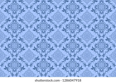 Seamless blue decorative pattern on background. Floral ornament on background. Wallpaper pattern. Template for design of your interior