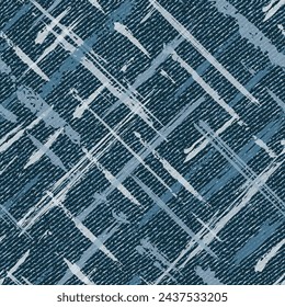 Seamless blue denim pattern with diagonal paint brush strokes, blots, spattered paint. Random composition. Grunge style