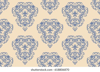 Seamless blue ornament on background. Wallpaper pattern
