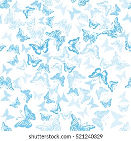 Seamless blue pattern with silhouettes of butterflies