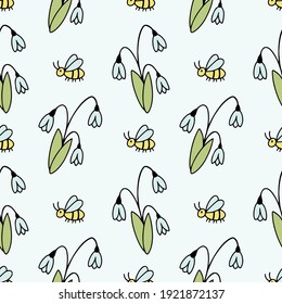 Seamless blue pattern with snowdrops. Spring background for sewing children's clothing, printing on fabric and packaging paper.