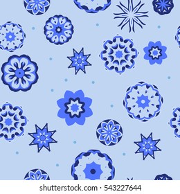 Seamless blue snowflake pattern.