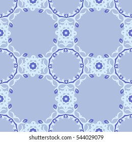 Seamless blue snowflake pattern.