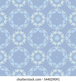 Seamless blue snowflake pattern.