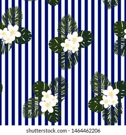 Seamless blue striped vector tropical pattern. Plumeria, frangipani.