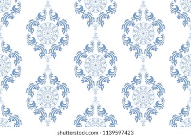 Seamless blue wallpaper pattern. Seamless ornament on background. Floral ornament on background.  Seamless pattern for your design. Textile pattern. Wallpaper pattern