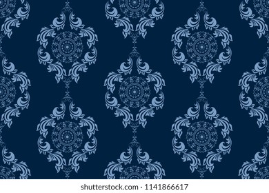 Seamless blue wallpaper pattern. Seamless ornament on background. Floral ornament on background.  Seamless pattern for your design. Textile pattern. Wallpaper pattern