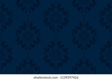 Seamless blue wallpaper pattern in vintage style. Seamless ornament on background. Floral ornament on background.  Seamless pattern for your design. Textile pattern. Wallpaper pattern