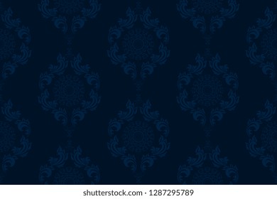 Seamless blue wallpaper pattern in vintage style. Seamless ornament on background. Floral ornament on background.  Seamless pattern for your design. Textile pattern. Wallpaper pattern