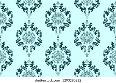 Seamless blue wallpaper pattern in vintage style. Seamless ornament on green background. Floral ornament on background.  Seamless pattern for your design. Textile pattern. Wallpaper pattern