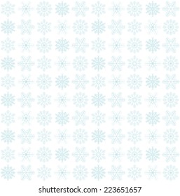 seamless blue and white colored snowflake background