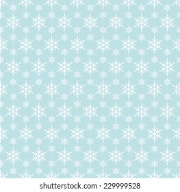 seamless blue and white colored snowflake background
