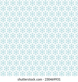 seamless blue and white colored snowflake background