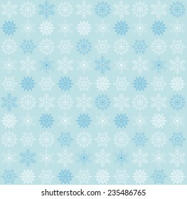 seamless blue and white colored snowflake background 