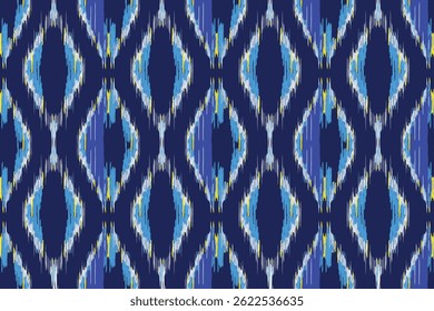 A seamless blue and white ikat pattern with a slightly blurred, diamond-like motif on a dark blue background.