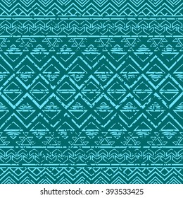 Seamless boho pattern with grunge effect. Hand drawn aztec wallpaper.