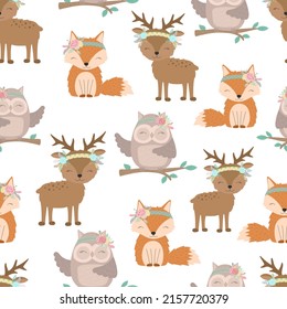 Seamless boho pattern. Vector image on national American motifs. Illustration of a little fox, deer and owl with feathers and flowers. For print, background, textile, holiday, children, baby, birthday