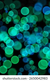 Seamless bokeh light background with soft blue and green glowing circles. Dreamy blurred effect perfect for party invitations, digital wallpapers, holiday designs, or decorative backgrounds.