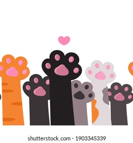 Borde sin foco con patas de gato negras y rojas y blancas alzadas con almohadillas y corazón, pancarta, marco