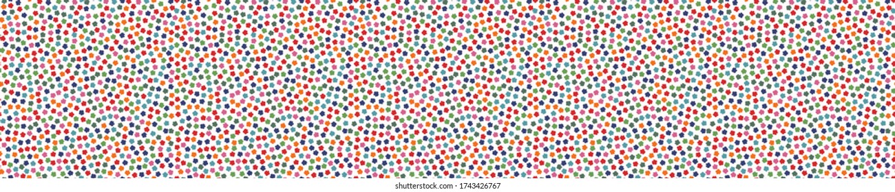 
Seamless border. Dense confetti dotty paper texture background. Tiny colored flecked polka dot sprinkles. Modern cute falling speckle banner pattern. Japanese kawaii kid summer party ribbon trim.