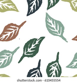 Seamless botanic pattern. Autumn colorful leaves imprints.Tile texture with imprints of the leaves. Vector