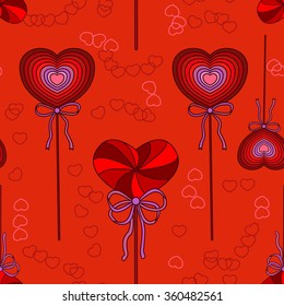Seamless bright background with candies the shape of hearts. Candy candies in the form of Valentines.