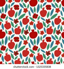 Seamless bright colorful floral pattern of pomegranates, flowers and leaves on white background. Perfect for textile, manufacturing, fabric etc. Vector illustration