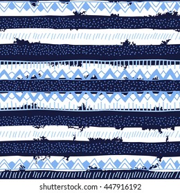 Seamless bright ethnic background in black, blue and white stripes. Vector illustration.