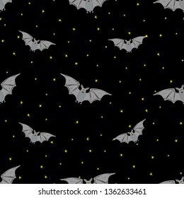 Seamless bright pattern with black bats and yellow stars