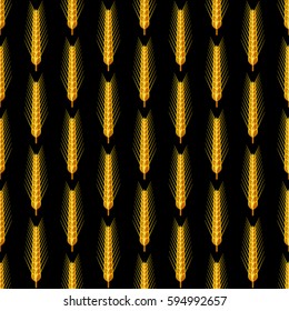 Seamless bright ripe barley on a black background.
