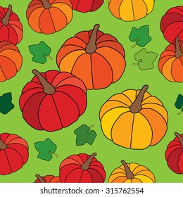 Seamless bright vector background with decorative pumpkins Happy Halloween