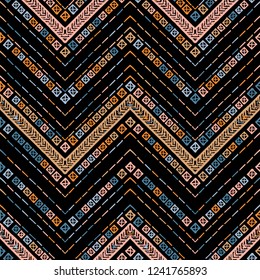 Seamless bronze metallic ethnic zigzag chevron pattern. Hand drawn colorful geometric background. Striped tribal motifs. Vector illustration