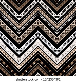 Seamless bronze metallic ethnic zigzag chevron pattern. Hand drawn colorful geometric background. Striped tribal motifs. Vector illustration