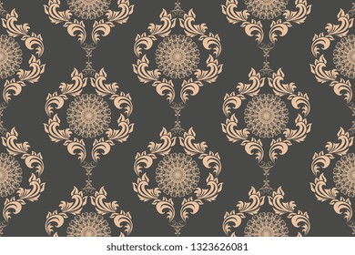 Seamless brown wallpaper pattern in vintage style. Seamless brown ornament on background. Floral ornament on background.  Seamless pattern for your design. Textile pattern. Wallpaper pattern