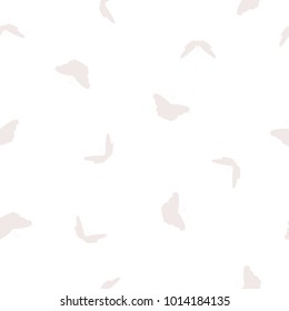 Seamless butterflies light pink silhouettes isolated on white background. Flying butterfly abstract pattern in pastel colors, vector, eps 10