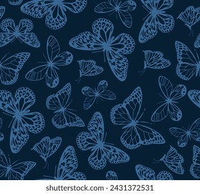 Seamless butterfly pattern. Repeating hand drawn vector print with a variety of blue butterflies on a navy blue background. Apparel textile pattern.