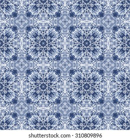 Seamless Calligraphy Pattern in white and blue.
Seamlessly repeating ornamental wallpaper or textile pattern with handwriting on blue background  in vector format.