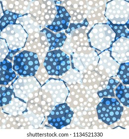 Seamless camouflage made up of translucent heptagons. Editable pattern. Above the pattern is a scattering of round spots.