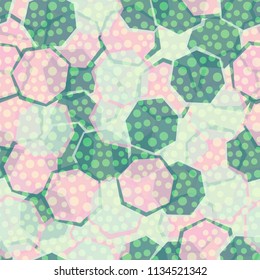 Seamless camouflage made up of translucent heptagons. Editable pattern. Above the pattern is a scattering of round spots.