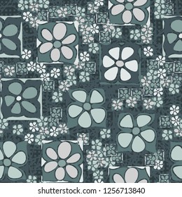 Seamless camouflage pattern. Abstract composition of square flowers located on the background of chaotic lines and rows of small squares.