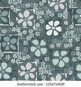 Seamless camouflage pattern. Abstract composition of square flowers located on the background of wavy lines and concentric rhombuses.