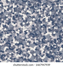 Seamless camouflage. The pattern is composed of brush stains. Random arrangement of elements. The colors of the winter landscape are blue and gray.