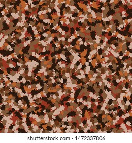 Seamless camouflage. The pattern is composed of brush stains. Random arrangement of elements. Colors of autumn landscape, orange, brown.