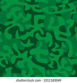 Seamless camouflage pattern in green tones. Vector illustration.