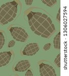 Seamless camouflage pattern with grenades.Vector illustration