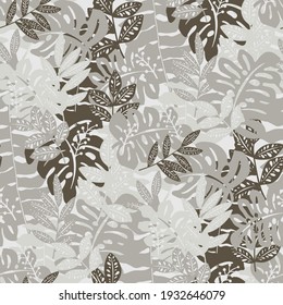 Seamless camouflage pattern with tropical leaves